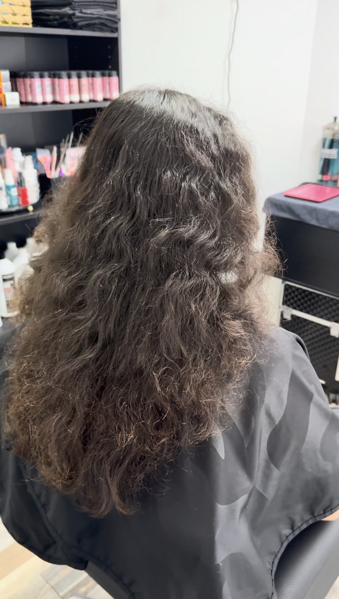 Before: dark, dull brown hair with frizzy, unstyled texture